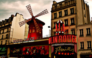 Red windmill city building air - an art deco sculpture free wallpaper
