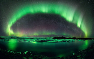 Green purple aurora borealis water - the foreground and mountains free wallpaper