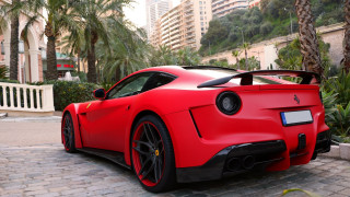 Red sports car brick road 8 - palm tree and buildings free wallpaper