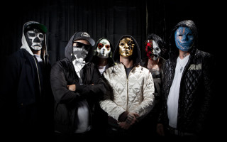Painted faces group dark room - dust free wallpaper