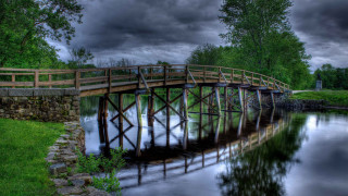 Wooden bridge river cloudy sky - a stone wall free wallpaper