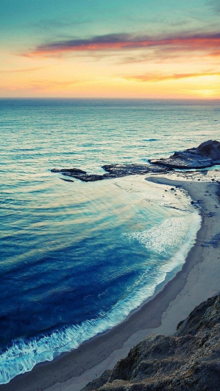 Beach sunset rocky shoreline waves - a few wave free wallpaper