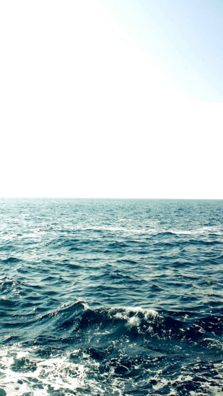 Person riding surfboard water sky - a person riding free wallpaper