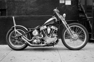 Motorcycle parked street building sign - a motorcycle free wallpaper