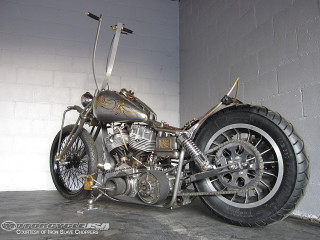 Motorcycle parked garage brick wall 2 - a wall free wallpaper