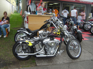Motorcycle parked crowd people grass - a motorcycle free wallpaper