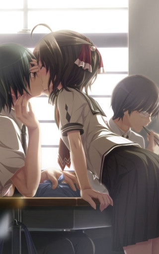 Couple sitting table laptop kissing 2 - the man free wallpaper