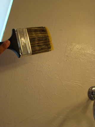 Person holding paint brush white 2 - a person holding free wallpaper