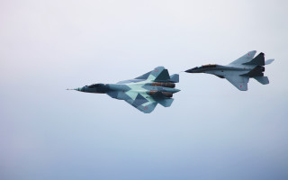 Fighter jets flying blue sky 2 - a blue sky background free wallpaper