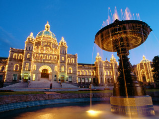 Fountain building lights night person - bruce munro free wallpaper