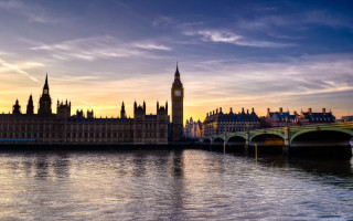 Large building clock tower river 3 - a bridge in front free wallpaper