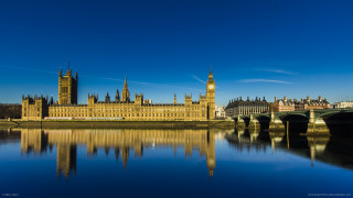 Large building clock tower river 7 - a bridge in front free wallpaper