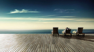 Two people sitting on chairs - chair free wallpaper