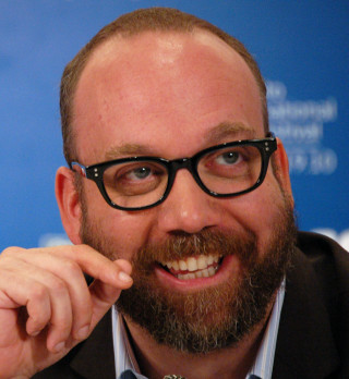 Man glasses beard smiling suit - his finger free wallpaper