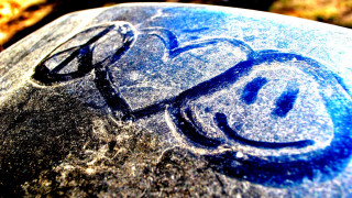 Close up rock face drawn - a face free wallpaper