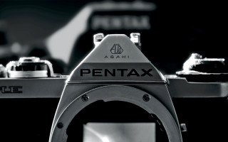 Pentax camera black white background - a detailed drawing free wallpaper