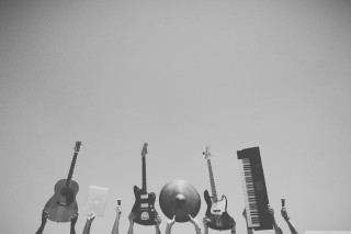 Guitars instruments row gray sky - against free wallpaper
