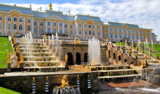 Large building fountain green lawn 2 - a green lawn in front free wallpaper