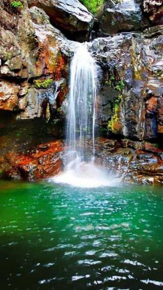 Waterfall green water rocks background - free nature wallpaper