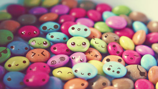 Colorful rocks with faces drawn 2 - different color free wallpaper