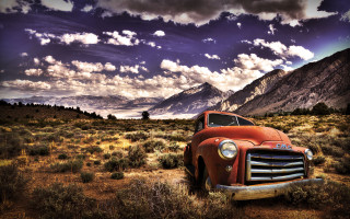 Old truck field mountains clouds - a mountain range in the background free wallpaper