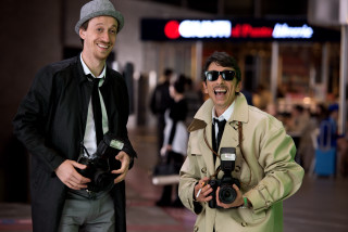 Two men cameras smiling together - camera free wallpaper