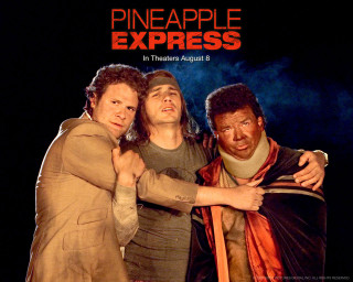 Three men posing dark background - a picture together in front free wallpaper