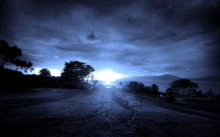 Dark road dark sky trees - the background and a sun free wallpaper