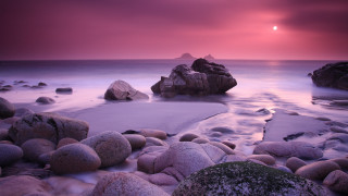 Beach rocks water purple sky - rich moody colour free wallpaper