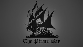 Pirate ship skull flag ocean - the front of it free wallpaper
