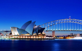 Large bridge water building night 2 - a large bridge over a body of water free wallpaper