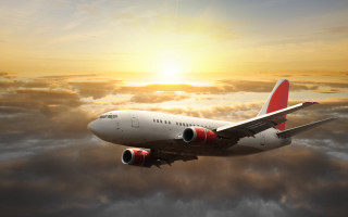 Jetliner cloudy sky sunset sun 3 - a cloudy sky free wallpaper