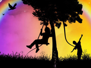 Person swinging rope rainbow sky - mystical free wallpaper