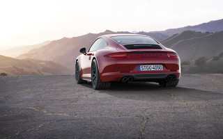 Red sports car mountains hills - a red sports car free wallpaper