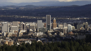 City tall buildings mountains cloudy - free city wallpaper