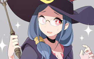 Woman witches hat holding wand - a yellow star free wallpaper