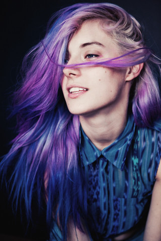 Purple hair woman smiling wind - eva frankfurther free wallpaper