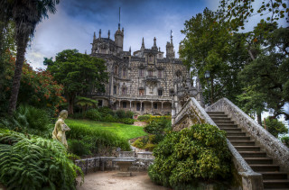 Castle staircase statue hill trees - a statue in front free wallpaper