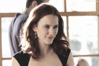 Woman black dress smiling man - a window behind her free wallpaper