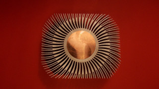 Circular object gold center red - alison kinnaird free wallpaper