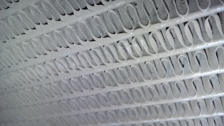 Close up wall pattern circles - a silk screen free wallpaper