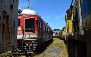 Train parked tracks field grass - a photo free wallpaper
