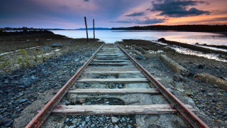 Train track sunset water background - great free wallpaper