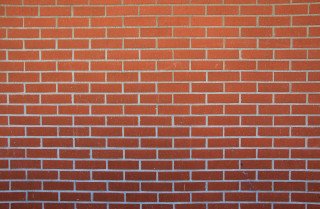 Red brick wall white clock 7 - a white clock free wallpaper
