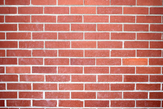Red brick wall white clock 6 - selfie free wallpaper