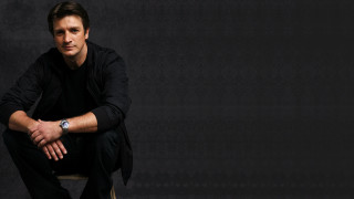 Man sitting chair hands knees 2 - dan scott free wallpaper