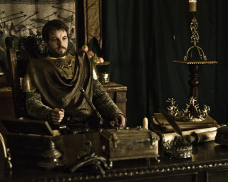 Medieval man sitting chair room - a chair in a room free wallpaper