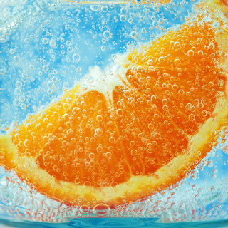 Orange slice water bubbles blue - a blue sky background free wallpaper