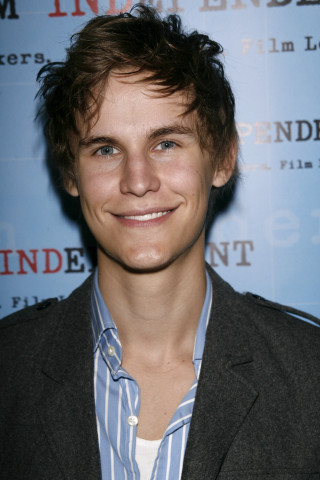 Smiling man blue background carpet - mitchell mohrhauser free wallpaper