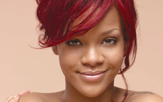 Woman red hair tattoo smiling 2 - a pink background behind her free wallpaper